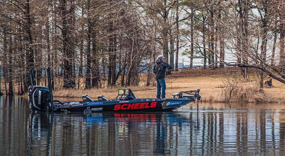 an angler on his boat fishing